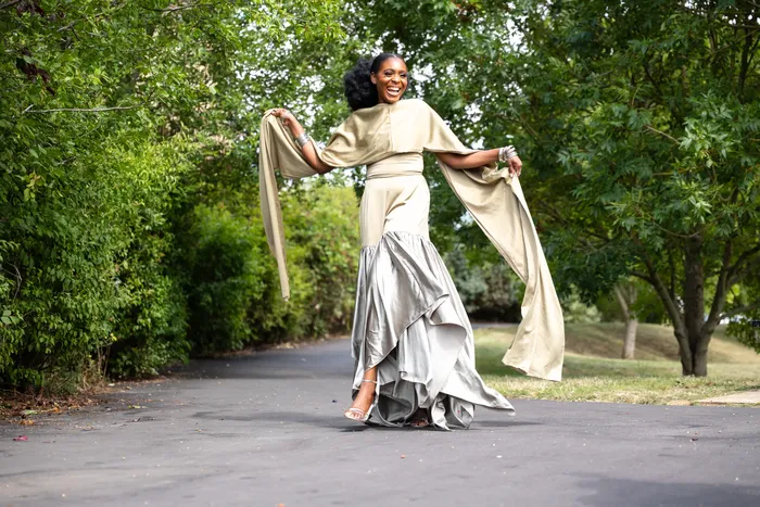 Group fashion shoot in satin gowns in a park, photographed by Imisi Bamiro, Coventry photographer