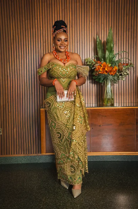 Traditional wedding portrait, couple in green and coral beads, photographed by Imisi Bamiro, Coventry photographer
