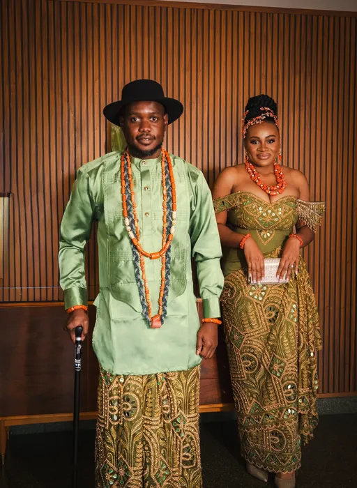 Traditional wedding portrait, couple in green and coral beads, photographed by Imisi Bamiro, Coventry photographer